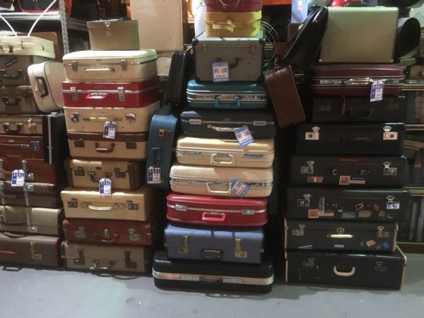 1: Stacks of Vintage Luggage