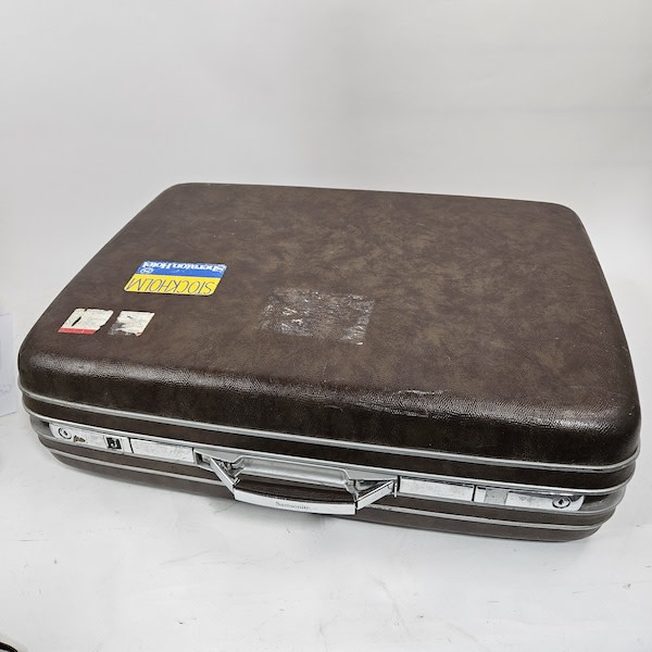 1: Brown Hard Case Suitcase