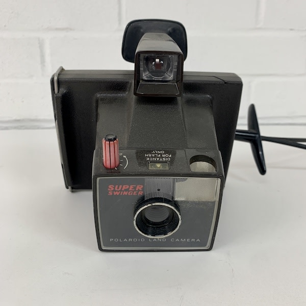 1: Super Swinger Polaroid Land Camera (Non Practical)