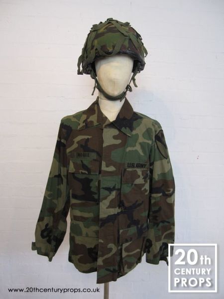 1: US Army Jacket And Camouflage Helmet