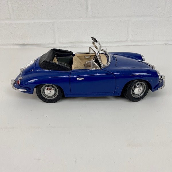 4: Vintage Blue Toy Car