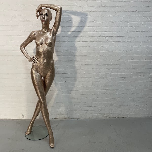 1: Gold Glittery Full Bodied Female Mannequin With Full Face, Hand Over Head