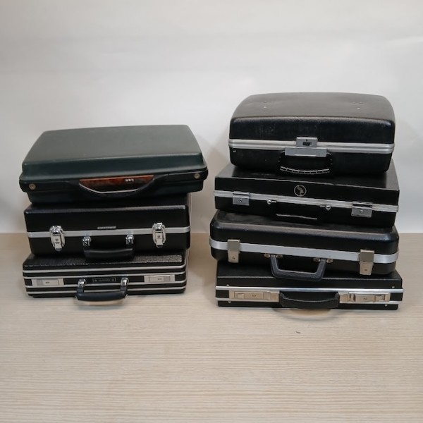 3: Stack Of Briefcases
