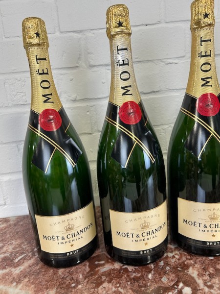 7: Prop Moet & Chandon Champagne Bottles