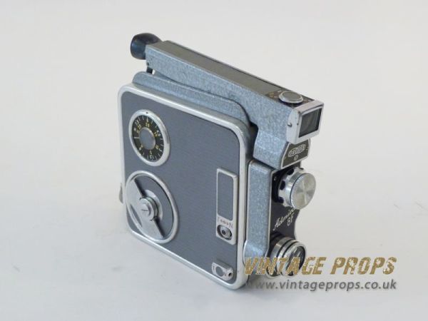 3: Non Practical Vintage 8mm Movie Camera On Tripod