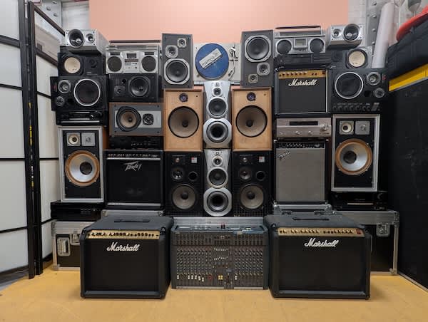 Large Speaker Stack with Amps, Sound Desks and Boomboxes