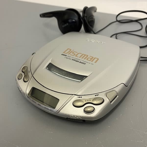 3: Silver Sony Discman & Headphones