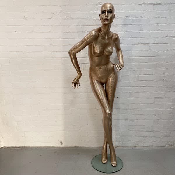 7: Gold Glittery Full Bodied Female Mannequin With Full Face, Left Hand On Hip