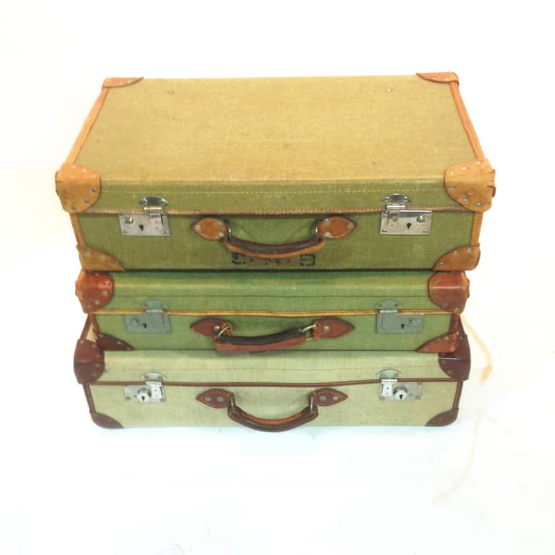 4: Stack Of 3 Green Vintage Canvas Suitcases