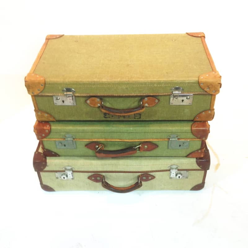 4: Stack Of 3 Green Vintage Canvas Suitcases