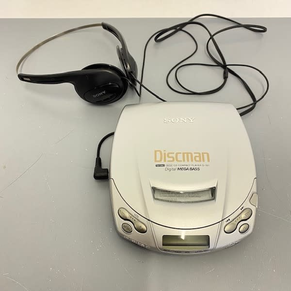 3: Silver Sony Discman & Headphones