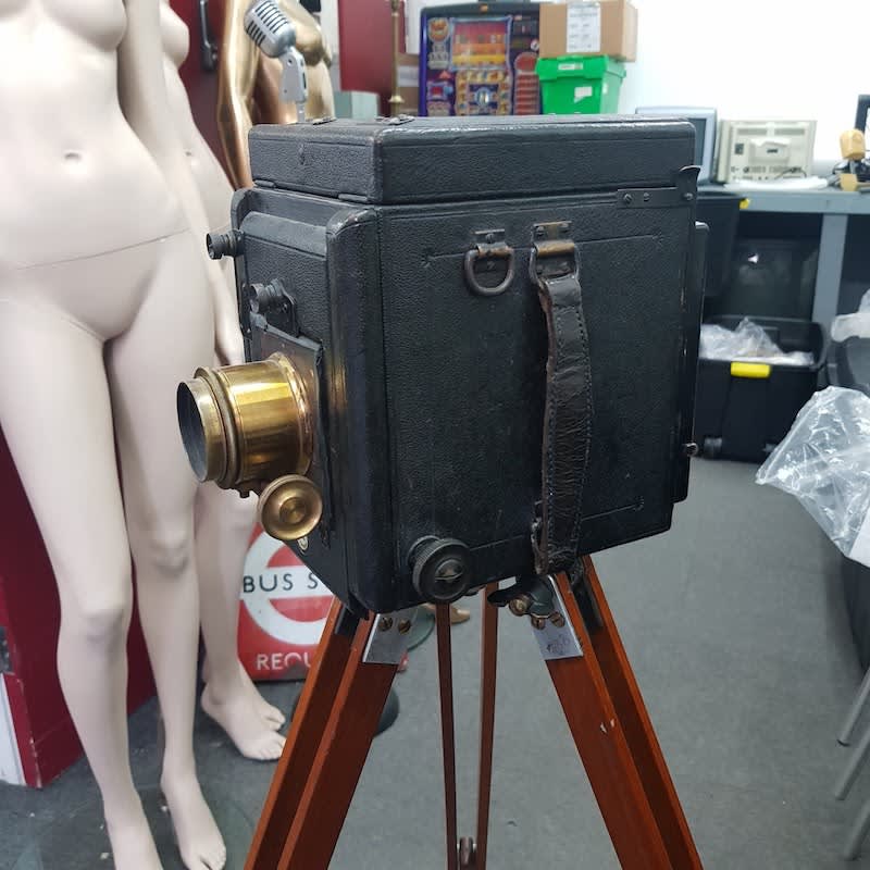 4: Non Practical Vintage Movie Camera On Wooden Tripod