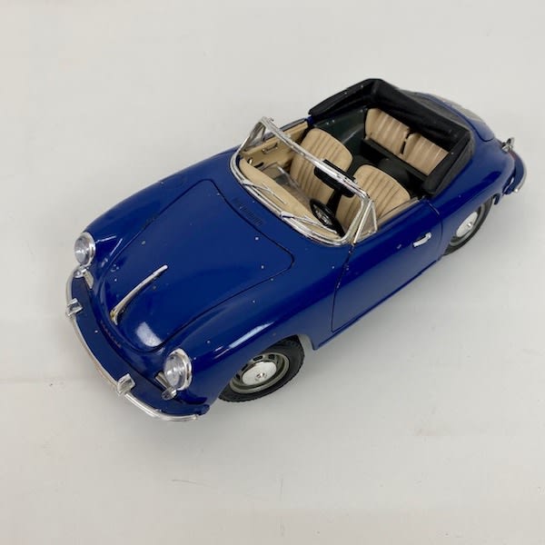 4: Vintage Blue Toy Car