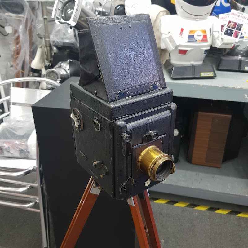 4: Non Practical Vintage Movie Camera On Wooden Tripod