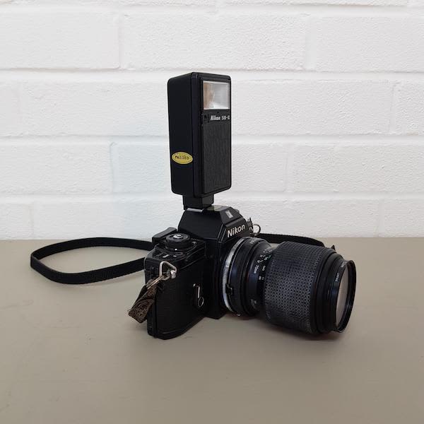 5: Nikon EM Long Lens Paparazzi Camera With Working Flash Unit