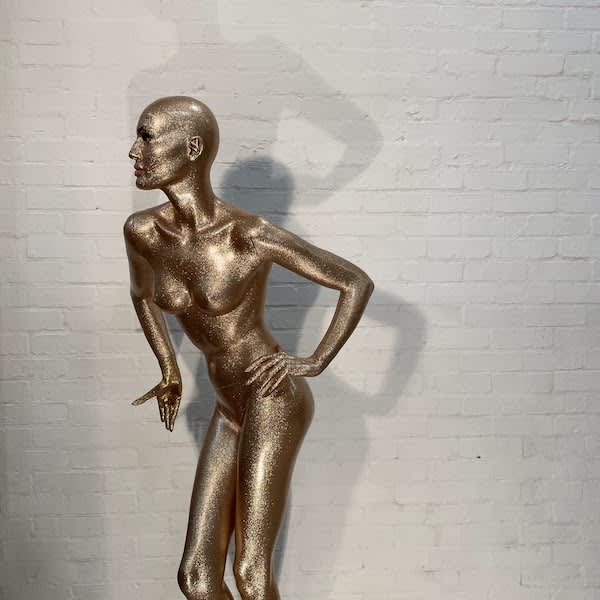 7: Gold Glittery Full Bodied Female Mannequin With Full Face, Left Hand On Hip