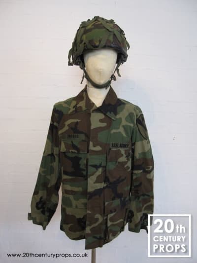US Army Jacket And Camouflage Helmet