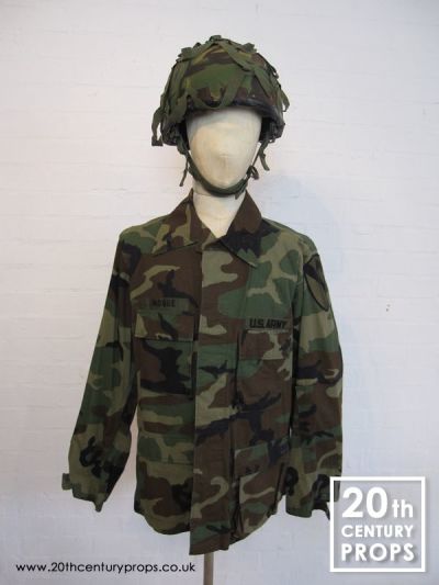US Army Jacket And Camouflage Helmet