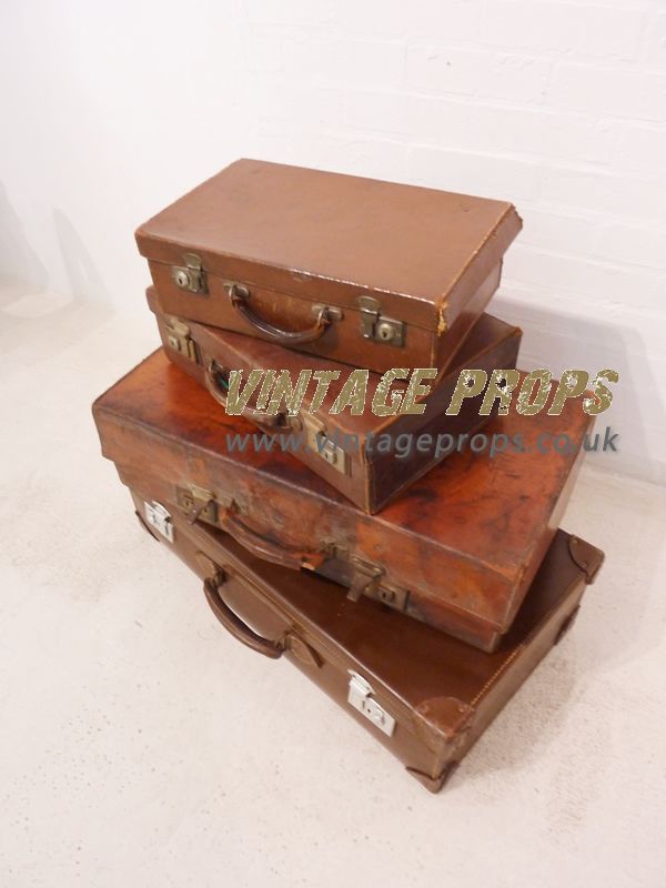 4 Leather Suitcases LONDON PROP HIRE