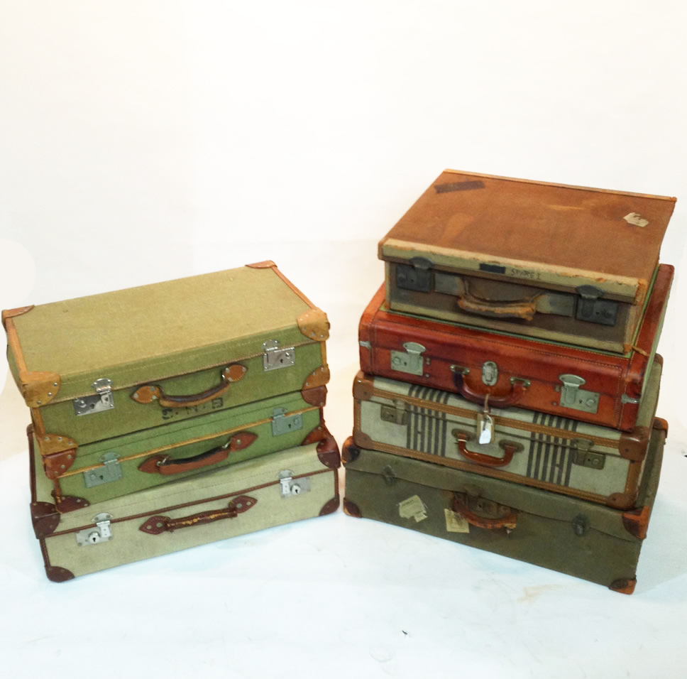 Stack of Vintage Canvas Suitcases LONDON PROP HIRE