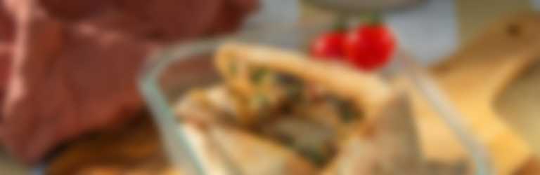 Parcel wrap met Looye Honingtomaten, citroenkip en harissagroenten