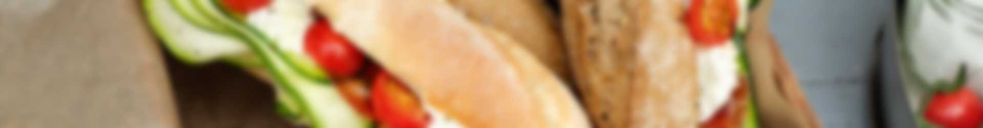 Stokbrood to go met mozzarella, ham, courgette en Honingtomaten