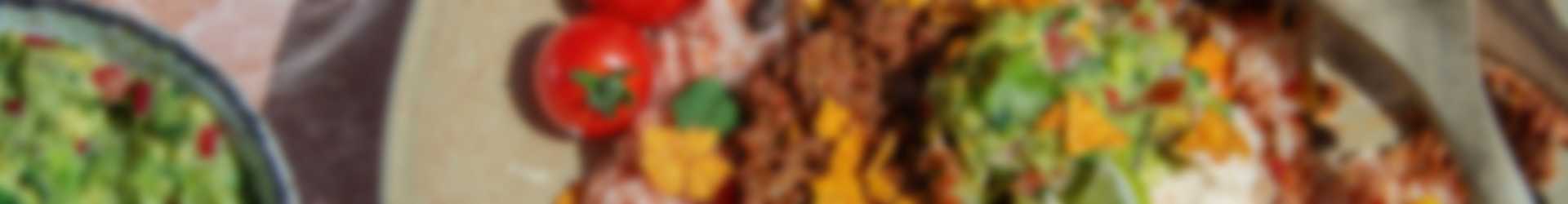 Mexicaanse salade bowl met Looye Joyn tomatenrijst, guacamole en crème fraîche dip 