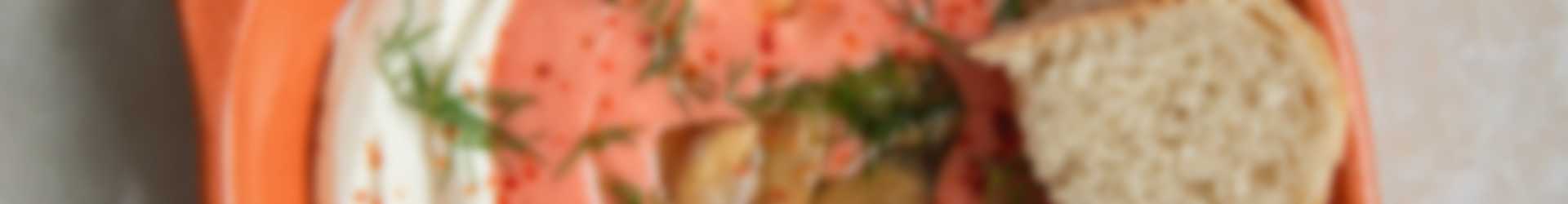 Labneh met Looye Honingtomaten, gekonfijte knoflook, dille, gebakken citroen en chili vlokken 