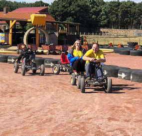 People in go karts