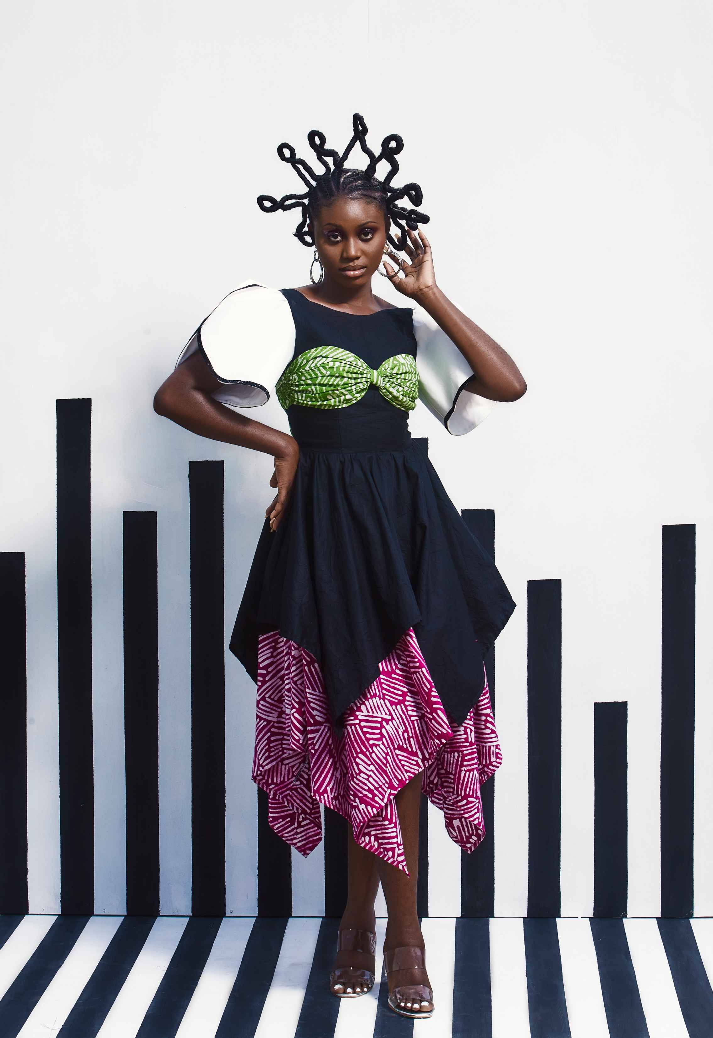 Ashabi Handkerchief-Cut Tiered Dress With Exaggerated Bustier And Dramatic Sleeves