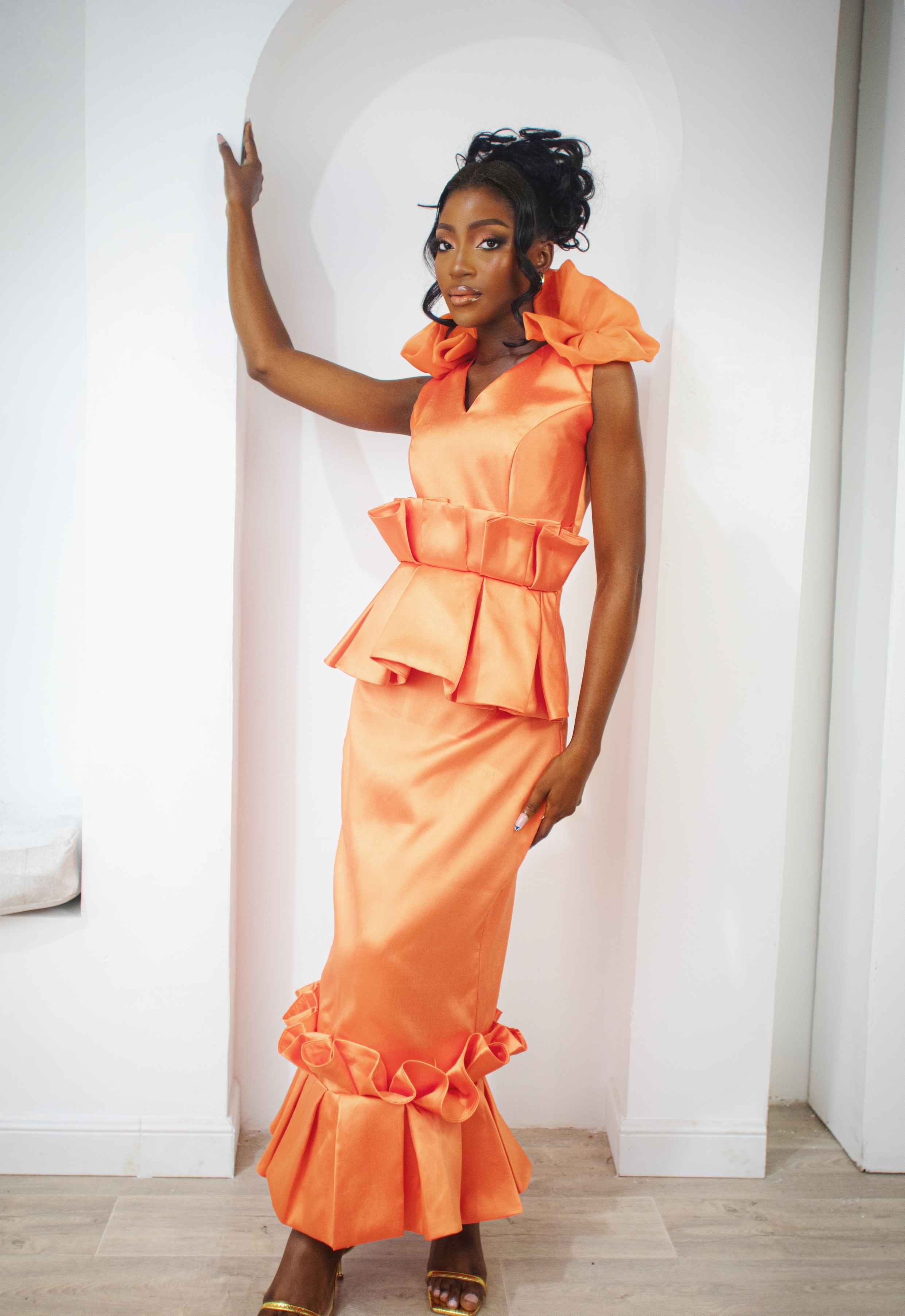 Amani Pleated Peplum Elegance Dress