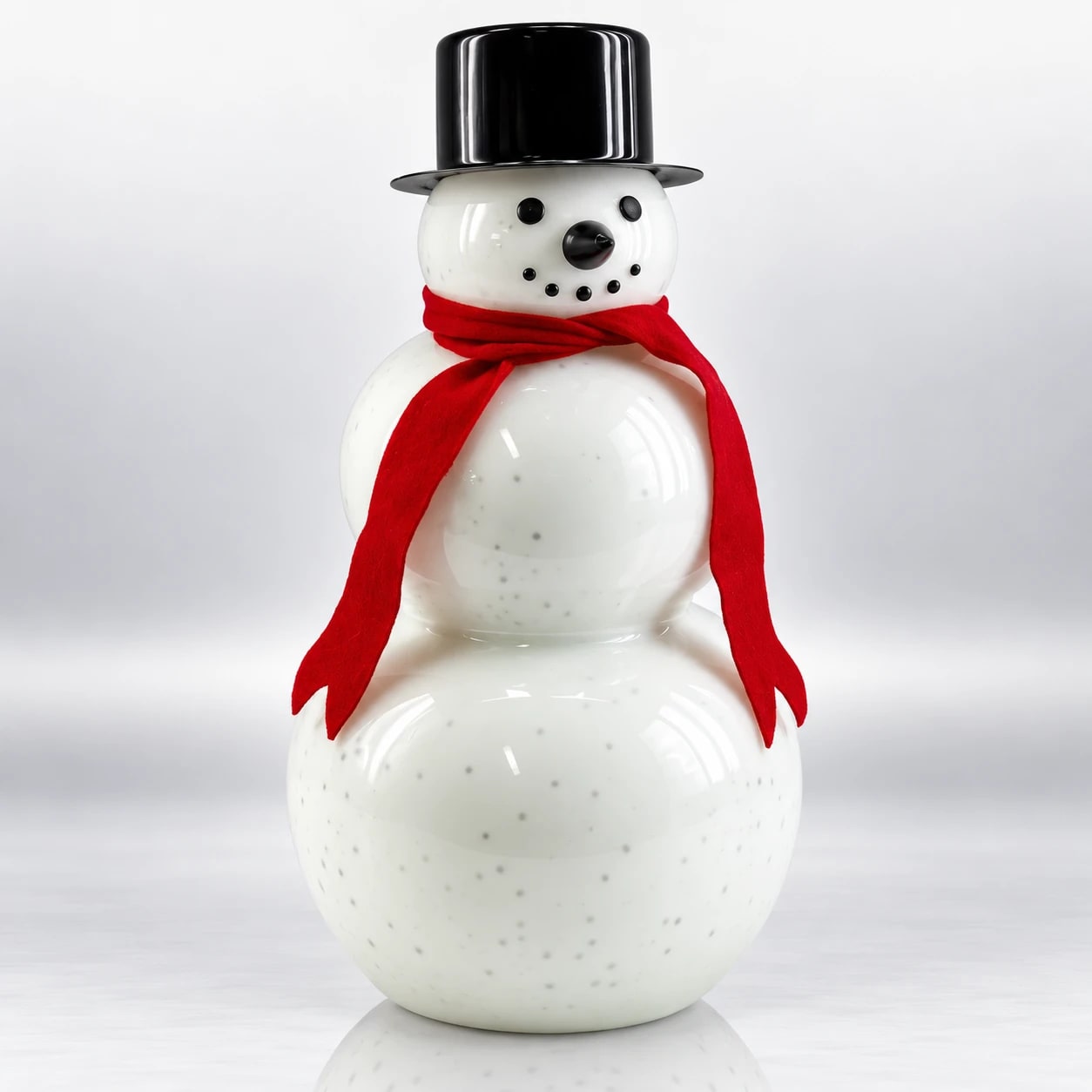 White glass snowman Christmas decoration with black top hat and red scarf