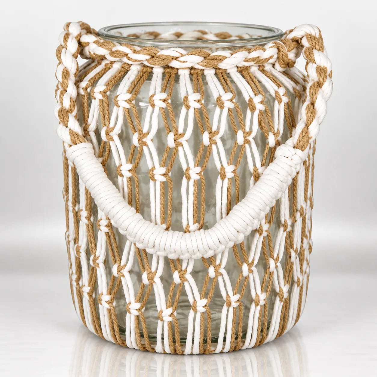 Clear glass candle holder with natural and white woven rope covering