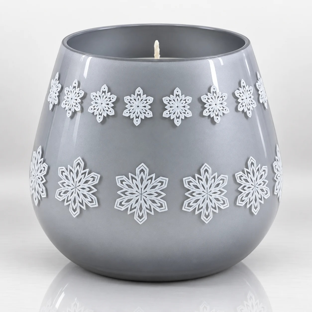 Grey Christmas votive candle holder with white snowflake decorations
