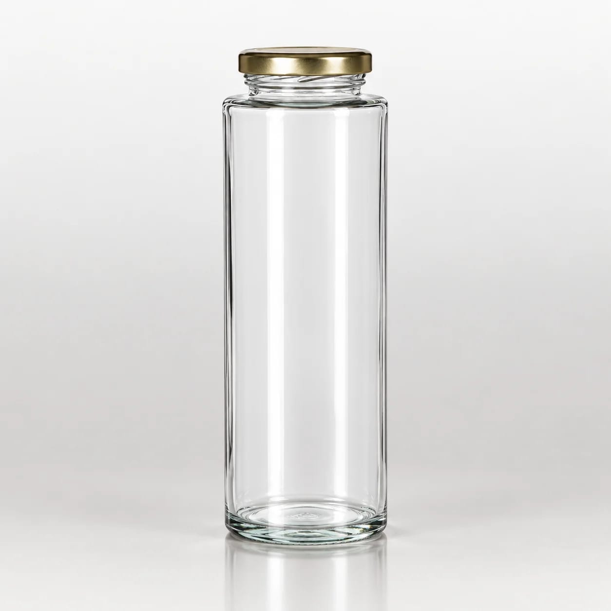 Clear tall cylindrical glass bottle with wide neck and metallic screw lid