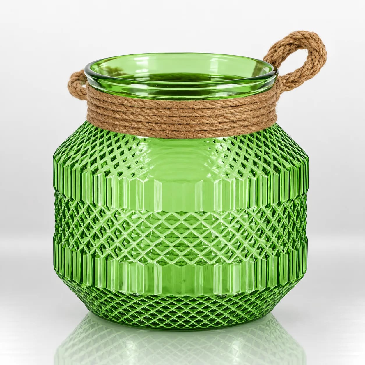 Green textured glass candle holder with a natural jute rope wrap and loop handle.
