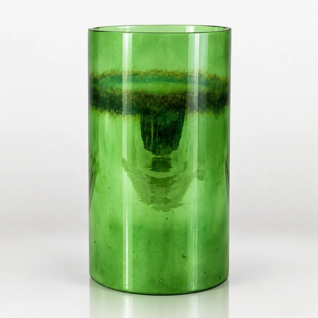Tall translucent green glass cylindrical candle holder with a subtly textured finish.