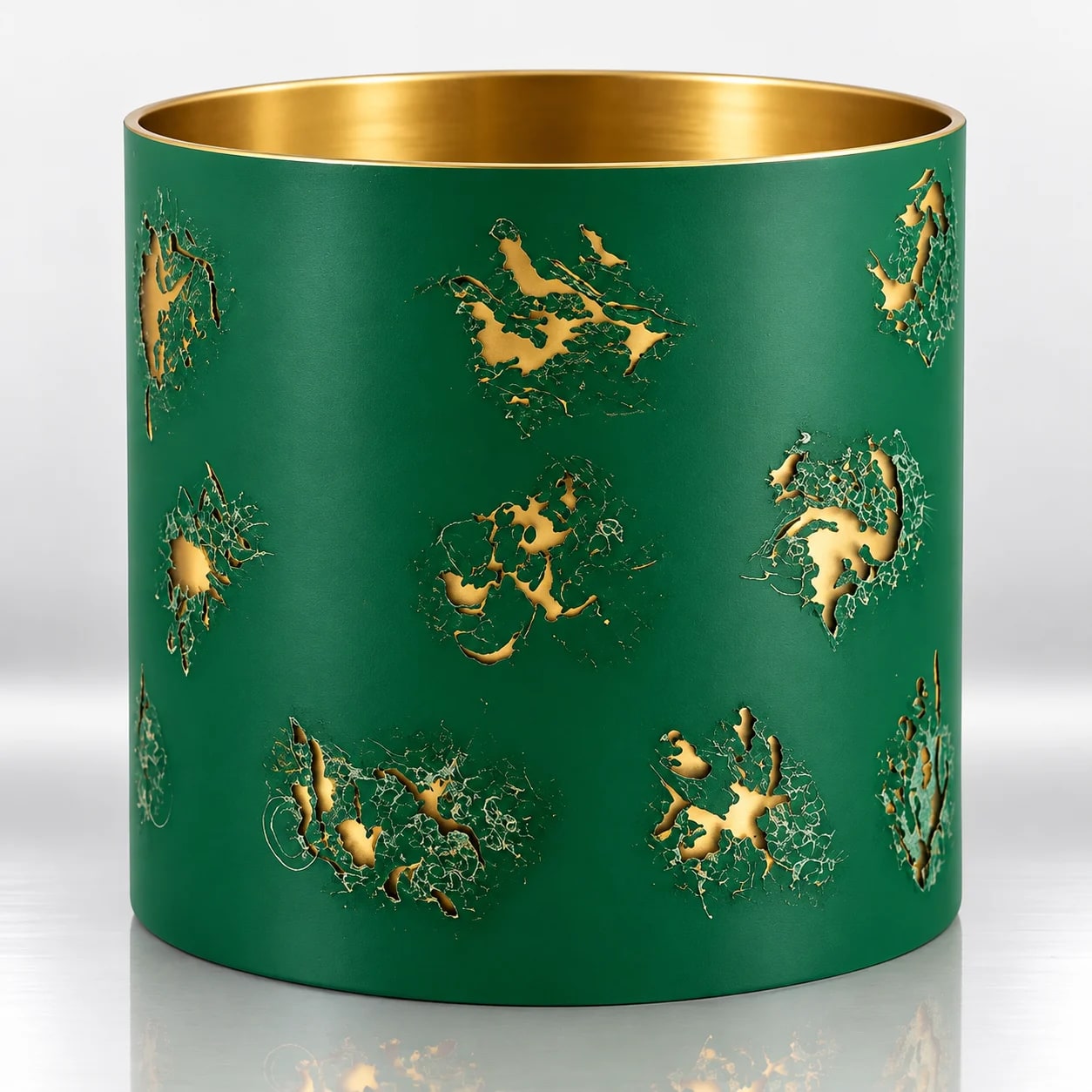 Emerald green cylindrical candle holder with irregular gold crackle detailing and a metallic gold interior.