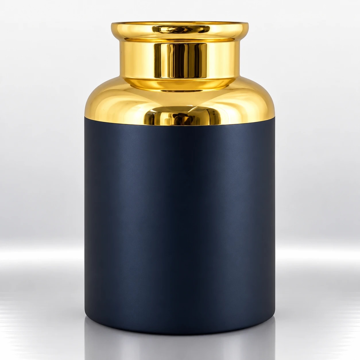 Tall navy blue cylindrical candle holder with a smooth body and polished gold-tone collar and upper section.