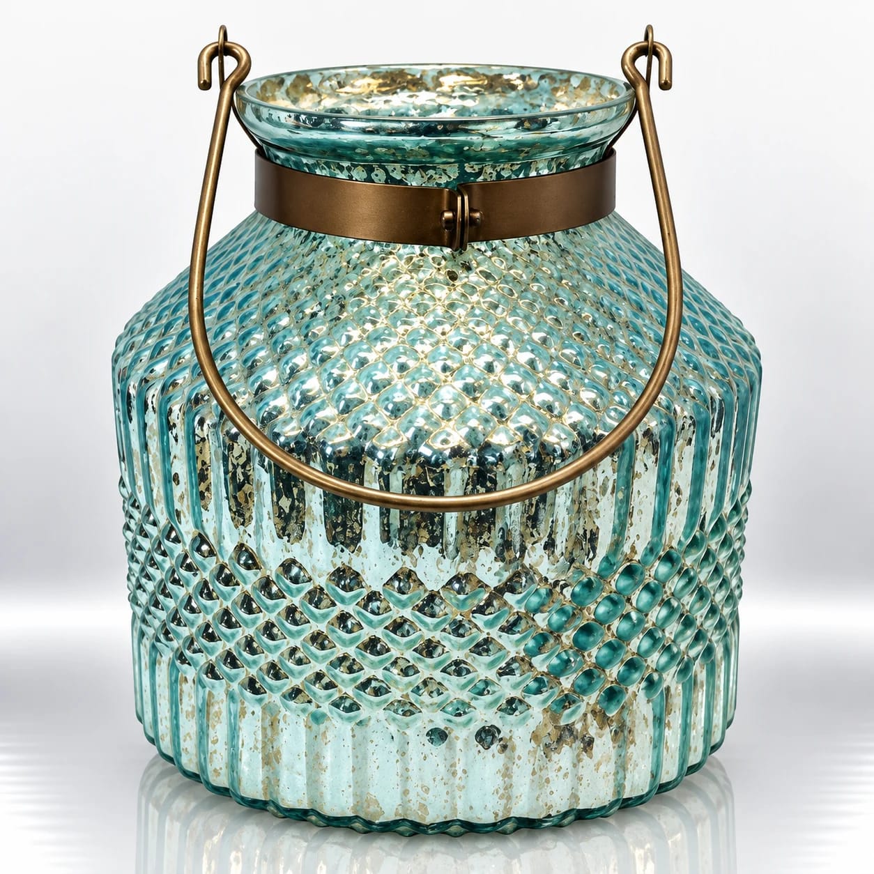 Aqua textured glass candle holder with antique gold speckles, raised diamond patterns, bronze neck band and curved metal handle.