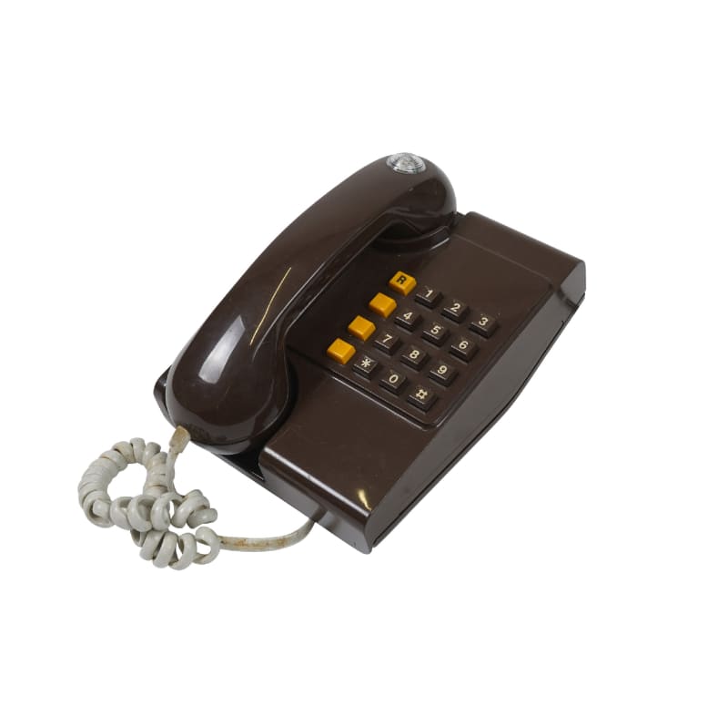 Brown 1980s British Telecom push button dialling phone