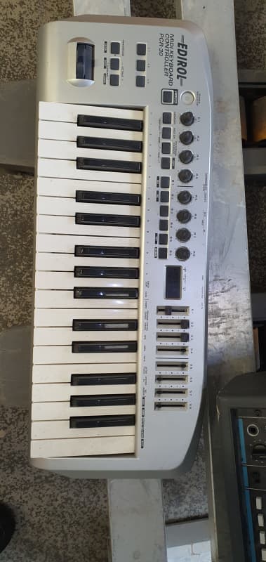 Compact music keyboard/organ