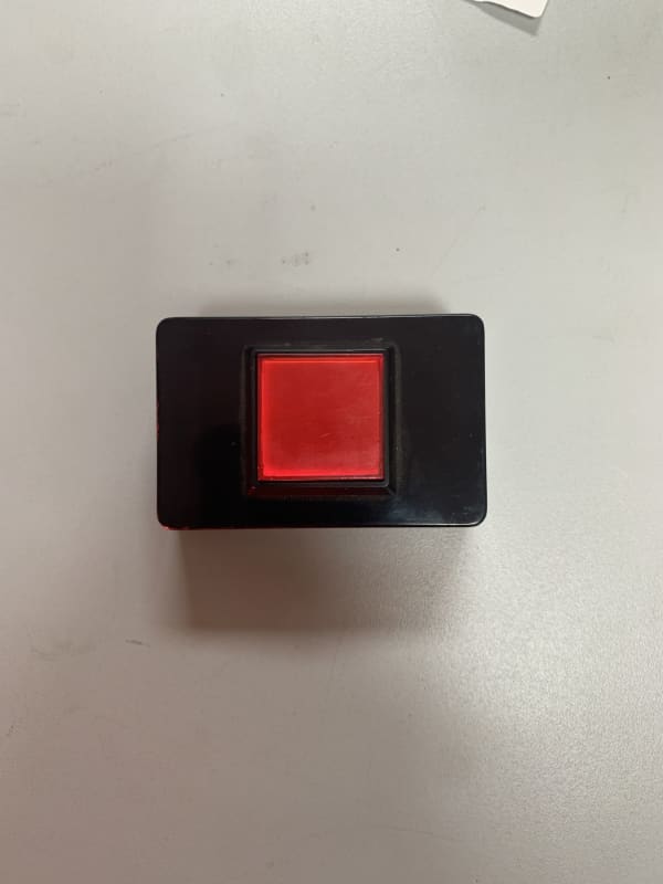 Simple red button in black box