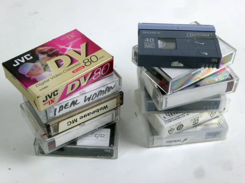 Assorted Digital Video DV tapes in cases, new & used