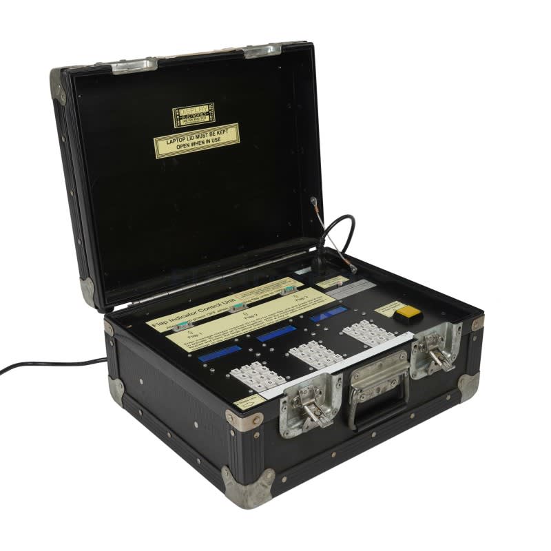 Practical black flight case with technical contents, keypads, displays etc