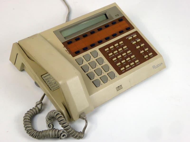 Beige office telephone with multiple speed dial buttons & LCD