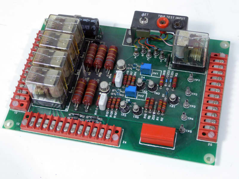 Printed Circuit Board with red terminal strips, coloured & transparent components