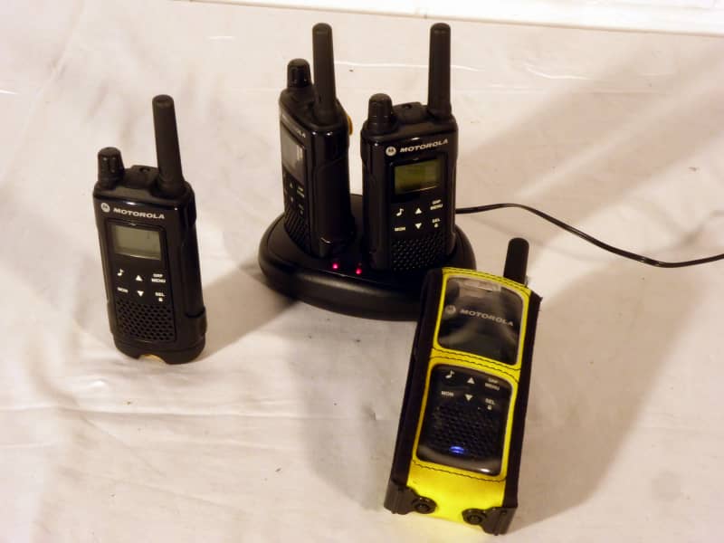 Practical modern compact walkie-talkies with optional day-glo covers, belt clips