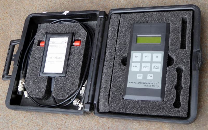 Ruggedised black case with technical handheld items
