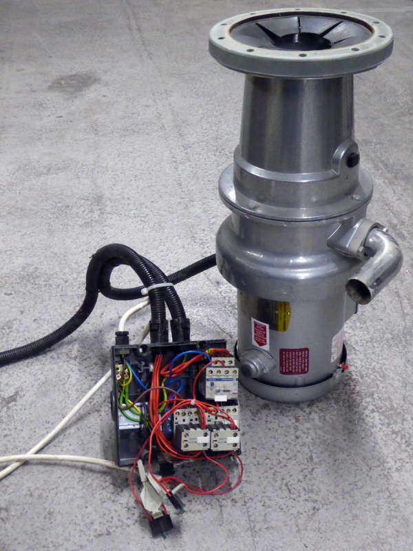 Metal turbine or rocket engine shape with wiring connected electrical box